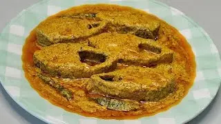 Bangladeshi Village Woman Cooking Hilsha Fish Curry With Traditional Mustard Sauce 