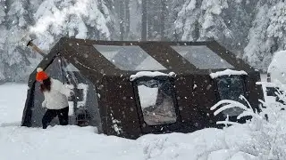 LUXURY TENT CAMP IN A SNOW-COVERED DESERTED FOREST