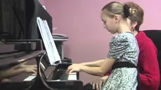 Piano lesson in progress. Working on A major scale