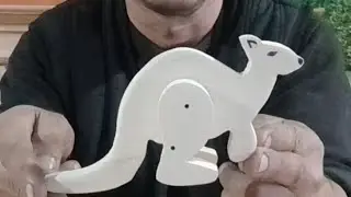 Jumping kangaroo. Wooden toy. Made from a board.