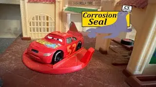 Disney Pixar Cars Corrosion Seal 57 (Beta/Concept Lightning McQueen) 2005 Teaser Racer.