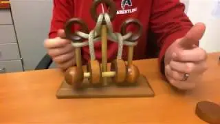 Wood Rope and Ring Puzzle Solution
