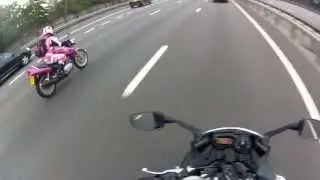 Girl on epic pink motorcycle