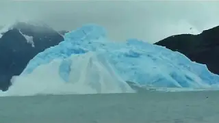 A cool video - Iceberg flipping over...
