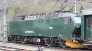 The Flåm Railway train arriving in Flåm