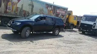 L200 тянет тягач МАЗ