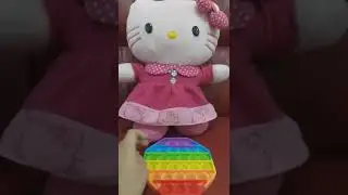 playing pop it with hello kitty doll #popit#fingerstyle#hellokitty#youtubeshorts#viralshorts#short