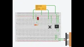Glowing LED with 9 V battery, 7805 Regulator, and 5 V Relay  in tinkercad