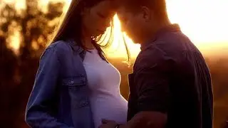 Pregnant with Her Partner Hugging Her and Holding Her Belly Outdoors | Stock Footage - Videohive