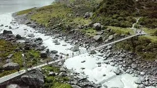 A Walk Bridge Built Over A Rocky River | DJI DRONE | No Copyright