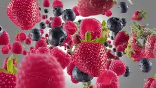 Burst of Strawberry Raspberry Blueberry in Grey Background