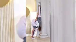 Flexible gymnast Ella doing splits.