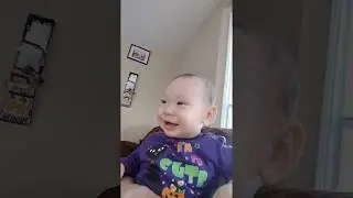 The babies laugh at each other