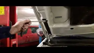 Установка газового упора амортизатора капота для Pajero Sport 2