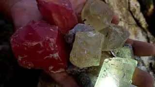 Red crystals are formed in volcanic caves by the sea. Gems, diamonds