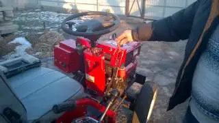 Conversion of a walk-behind tractor into a mini tractor