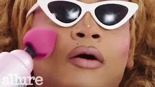 It's giving Home Depot. RuPaul's Drag Race All Stars Queens Try Applying Makeup With a Massage Gun
