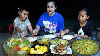 Mother and children collect vegetables around home and cooking - Cook and Eat