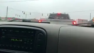 Severe Thunderstorm Warning on AM Radio inside my Sister's 2002 Ford Explorer during heavy T-Storms