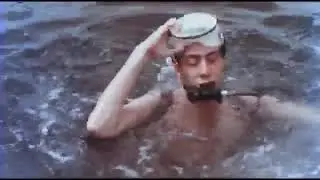 Hot Vintage Scuba Woman breathes through Regulator