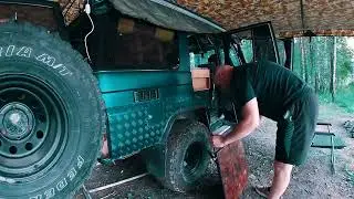 Camping together on the picturesque shore of a reservoir, thunderstorm and rain