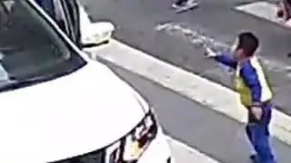 Boy kicks the car