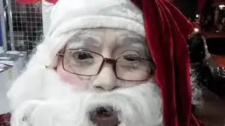 Papá Noel promocionando su show navideño