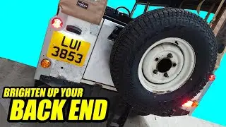 The Land Rover gets leather straps and a brighter back end. What could go wrong?