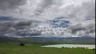Green Meadows and Fields Around The Lake | Stock Footage - Envato elements