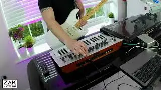 'Neon Rain (Remix)' live Synthwave performance by Zak Vortex