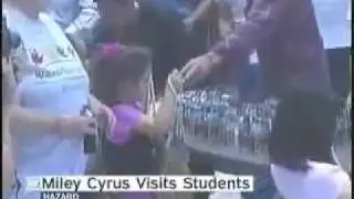Miley Ray, and Billy Ray Cyrus visits students at Kentucky school