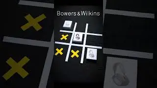 Looks like Bower beat Wilkin! in their tic-tac-toe match, but these headphones are unmatched! 🎶🎧