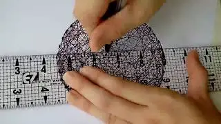 Time lapse drawing of sacred geometry parabolic curve flower