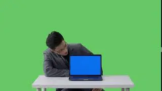 4k green screen synthetic keying image of a business man in a suit showing a laptop