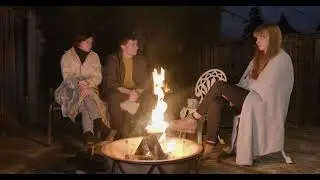 People talking around the fire...