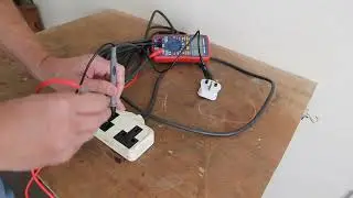 Testing troubleshooting electrical extention lead with multimeter