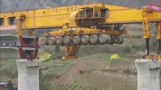 Мегамашины мостоукладчик SLJ900/32