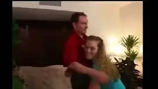 Women lifts and carry man like a baby