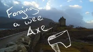 Forging an axe keyring at Eilean Donan Castle, wandering blacksmith. Nate's Forge