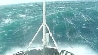 A tug boat in a 12 strength ! rogue wave