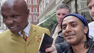 Chris Eubank meeting fans and signing autographs