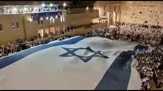 Jerusalem Day 2022: Giant Israeli Flag during prayers at the Western Wall