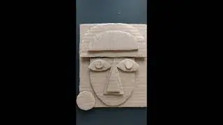 Escultura relieve cartón