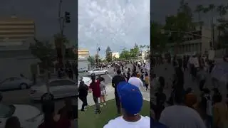 Car drives through crowd protesters in Bakersfield.  George Floyd protests.