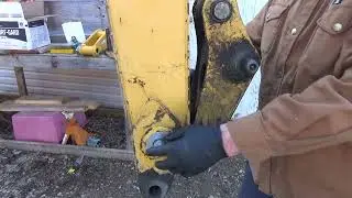 We have some new backhoe parts to install on the 110TLB