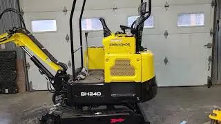 GroundHog Equipment; How to put a track on a mini excavator!