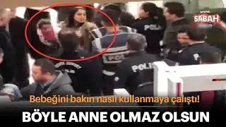 Öfkeli kadın bebeğini polislerin üzerine fırlatmaya kalktı (SICAK GELİŞME)