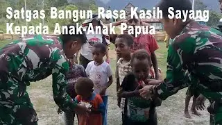 Bagikan Snack Gratis, Satgas TNI Bangun Rasa Kasih Sayang Kepada Anak-Anak Papua
