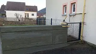 Réaliser un mur en béton et une clôture