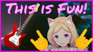 Akirose headbanging while shredding the guitar
